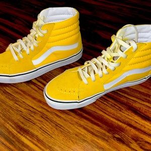 Stand out in these bright yellow high top Vans! Hardly worn, super cute!
